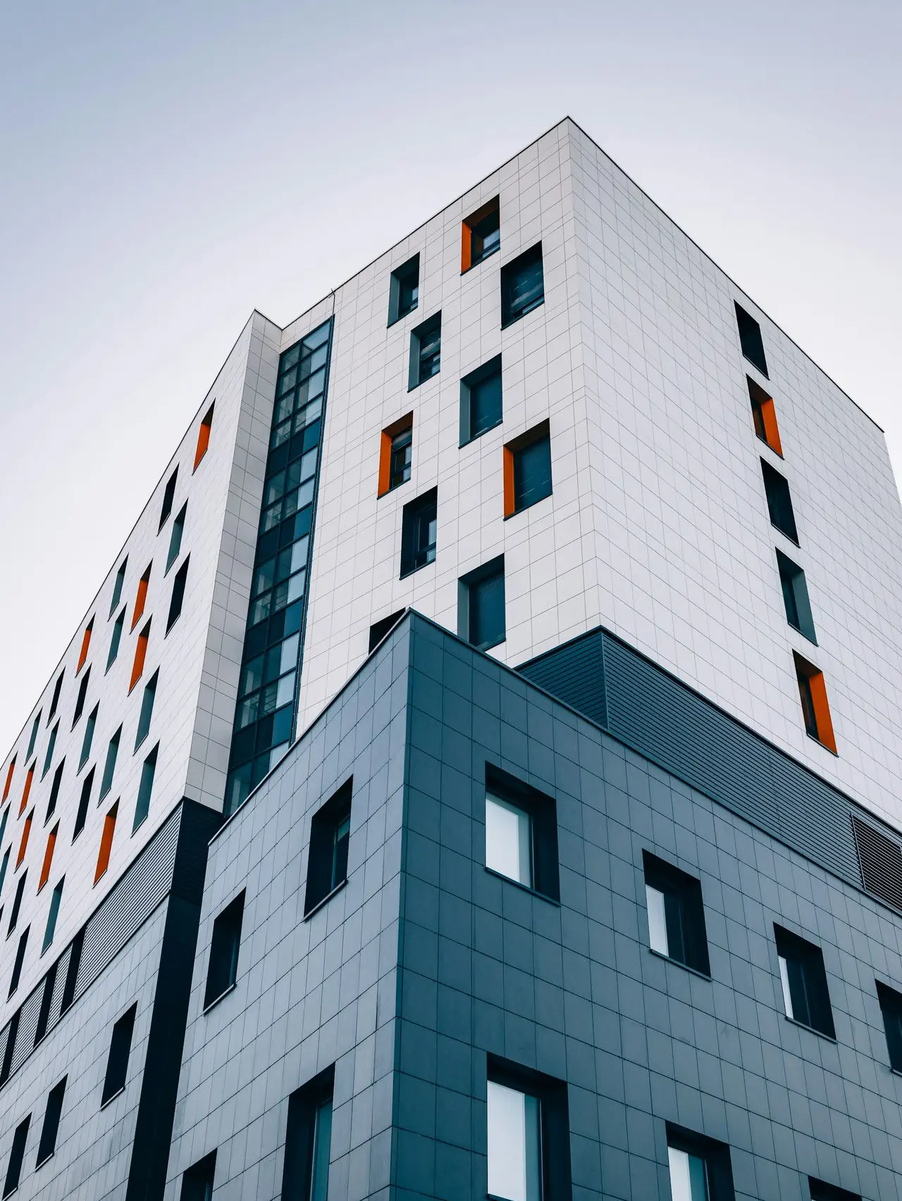 blue and white building across sky